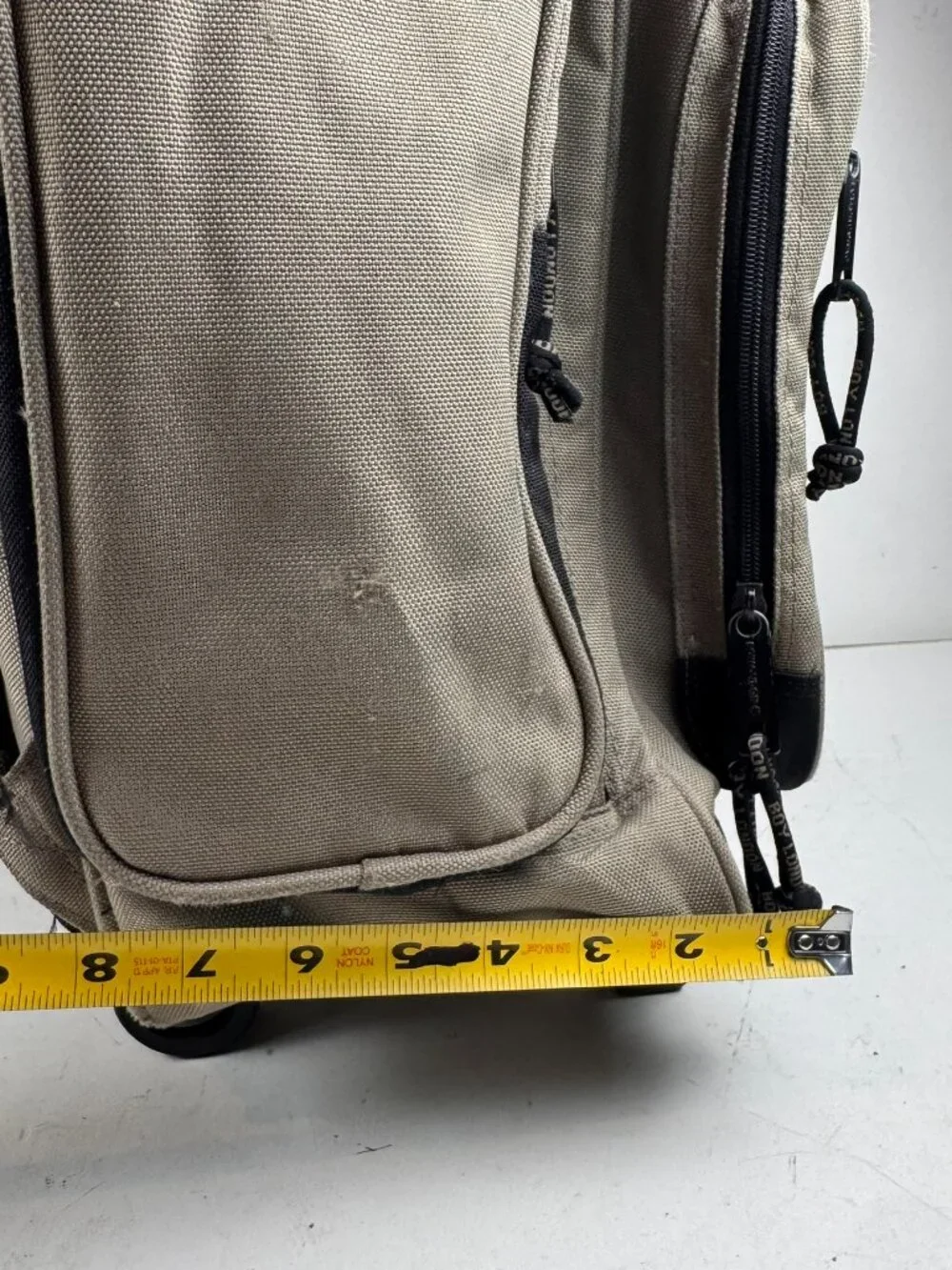 boy london rolling backpack tan wheeled suitcase travel bag tear fraying flaw